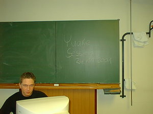 [Q]Schatt in front of the chalkboard