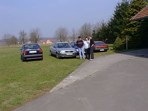 The bunch in front of their cars