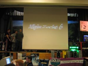 The video projection screen welcomes you to the party